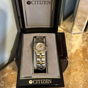 Gently used Citizen Quartz Watch is water-resistant and has a 7” bracelet.